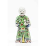 A laughing boyChinese porcelain sculpturesPolychrome decorationQing dynasty, 19th centuryHeight: