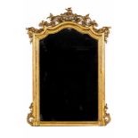 A large Napoleon III mirrorGilt and carved wooden frameFoliage scroll, floral and bird