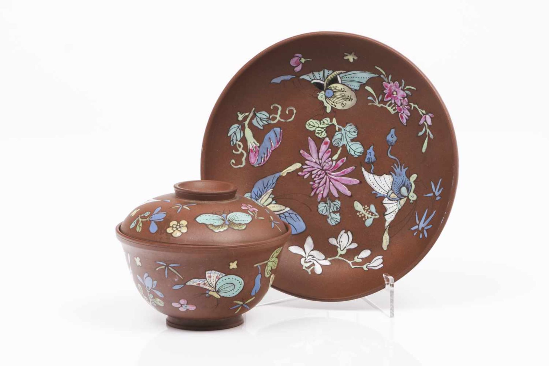 Yixing lided cup and saucerReddish brown clayPolychrome enamelled decoration with flowers and