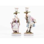 A pair of candle standsBisque porcelainGallant figure shaftsPolychrome decorationEurope, 19th/20th