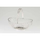 A bread basketPortuguese silverThreaded body of shaped rim and articulated handle with identical