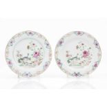 A pair of platesChinese export porcelain"Famille Rose" enamelled decoration with garden and