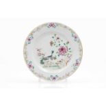 A plateChinese export porcelain"Famille Rose" enamelled decoration with gardenscape and