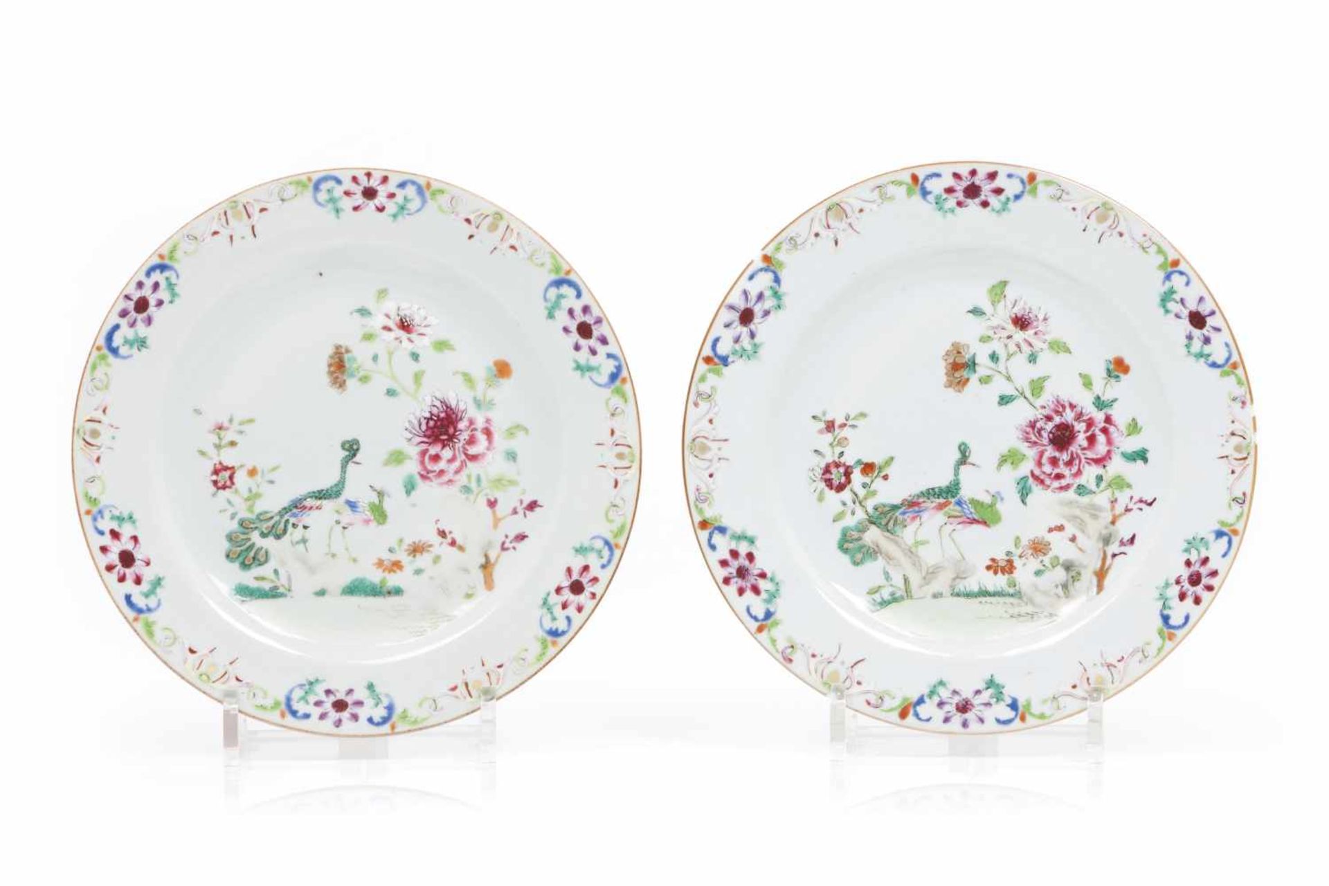 A pair of platesChinese export porcelain"Famille Rose" enamelled decoration with garden and