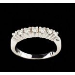 A ringGold "Memory"Set with 7 brilliant cut diamonds (ca.0.50ctOporto hallmark, Deer 800/000 post