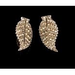 A pair of earringsSilver and gold shaped as leaves and paved with rose cut diamonds French assay