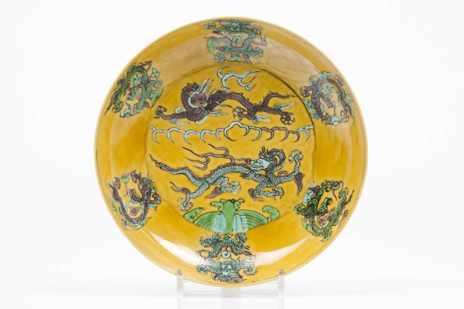 A plateDragon green and aubergine enamelled decoration on a yellow groundDaoguang marks (1821-