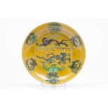 A plateDragon green and aubergine enamelled decoration on a yellow groundDaoguang marks (1821-