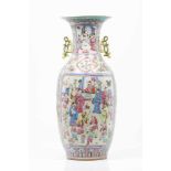 A large vase Chinese porcelain Famille Rose and gilt decoration depicting oriental figures