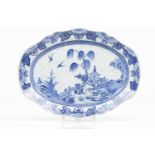 A scalloped trayChinese export porcelainBlue and white decoration with riverscape, rocks and