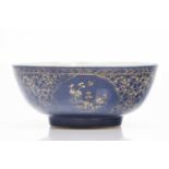 A punch bowlChinese export porcelainPowder Blue decoration with gilt flower motifsThe interior of