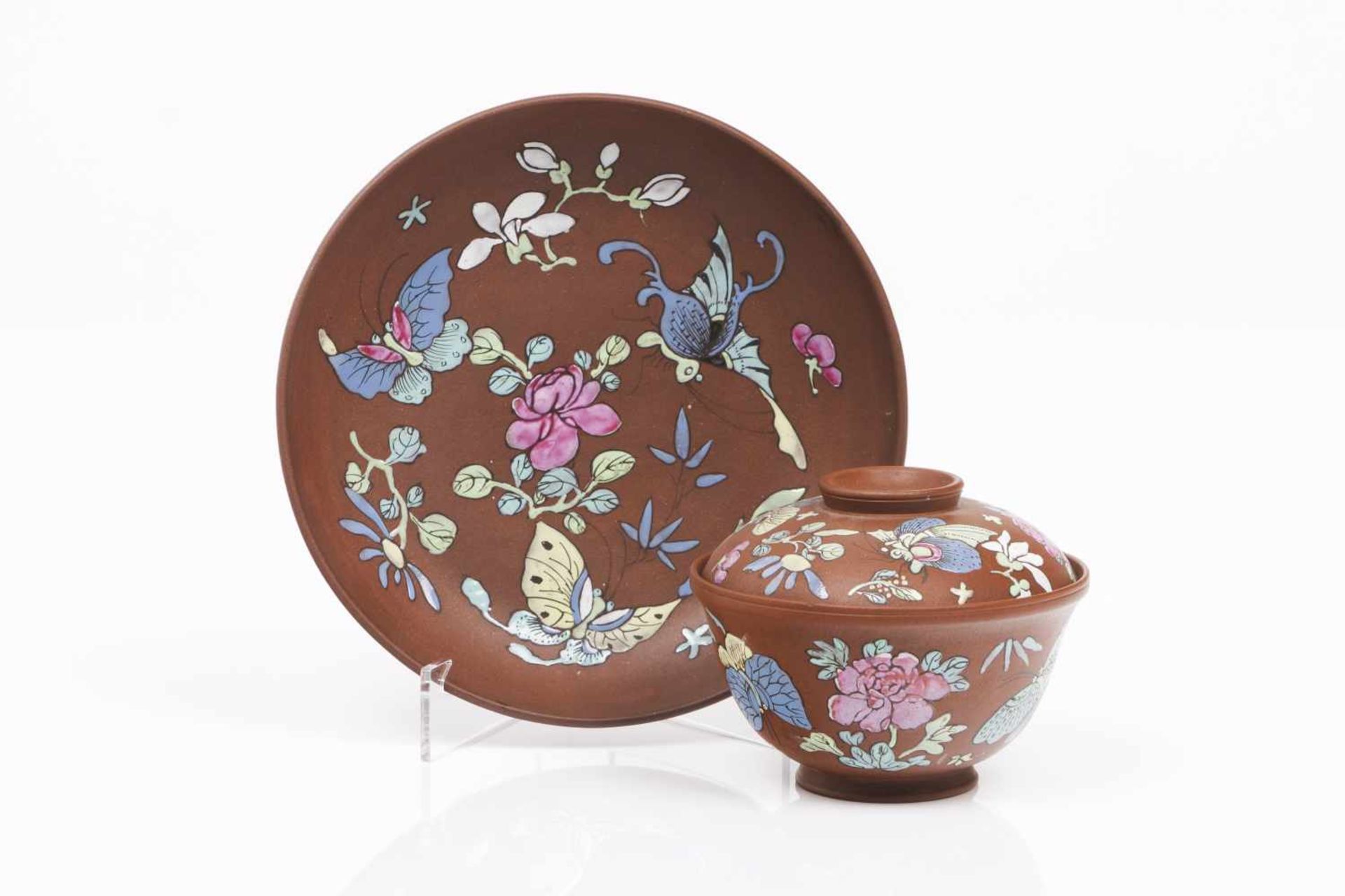 Yixing lided cup and saucerReddish brown clayPolychrome enamelled decoration with flowers and