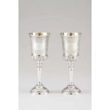 A pair of drinking vesselsPortuguese silver Raised and chiselled floral and foliage decorationLisbon