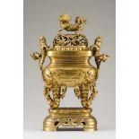 A large lided incense burner with stand Gilt bronze Moulded and raised bamboo decoration Inscribed