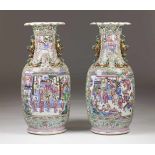 A pair of potsChinese export porcelain"Famille Rose" decoration of large cartouches with daily