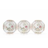 A set of three octagonal platesChinese export porcelain"Famille Rose" enamelled decoration with