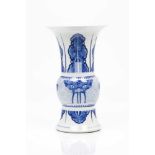 A tubular vaseChinese porcelainArchaic inspired blue underglaze decoration with taotie masks and