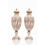 A pair of vases with coverChinese style french porcelainPolychrome and gilt floral decoration on a