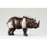 A rhinocerosLeather and silverMoulded leather depicting a rhinoceros, with engraved silver applied