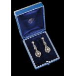 A pair of Romantic earringsGold and silver, 19th / 20th centuryArticulated pendants set with 4