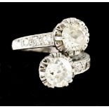 A Toi et Moi ringPlatinumSet with 2 L/M coloured antique brilliant cut diamonds, each (ca.1.00ct) or