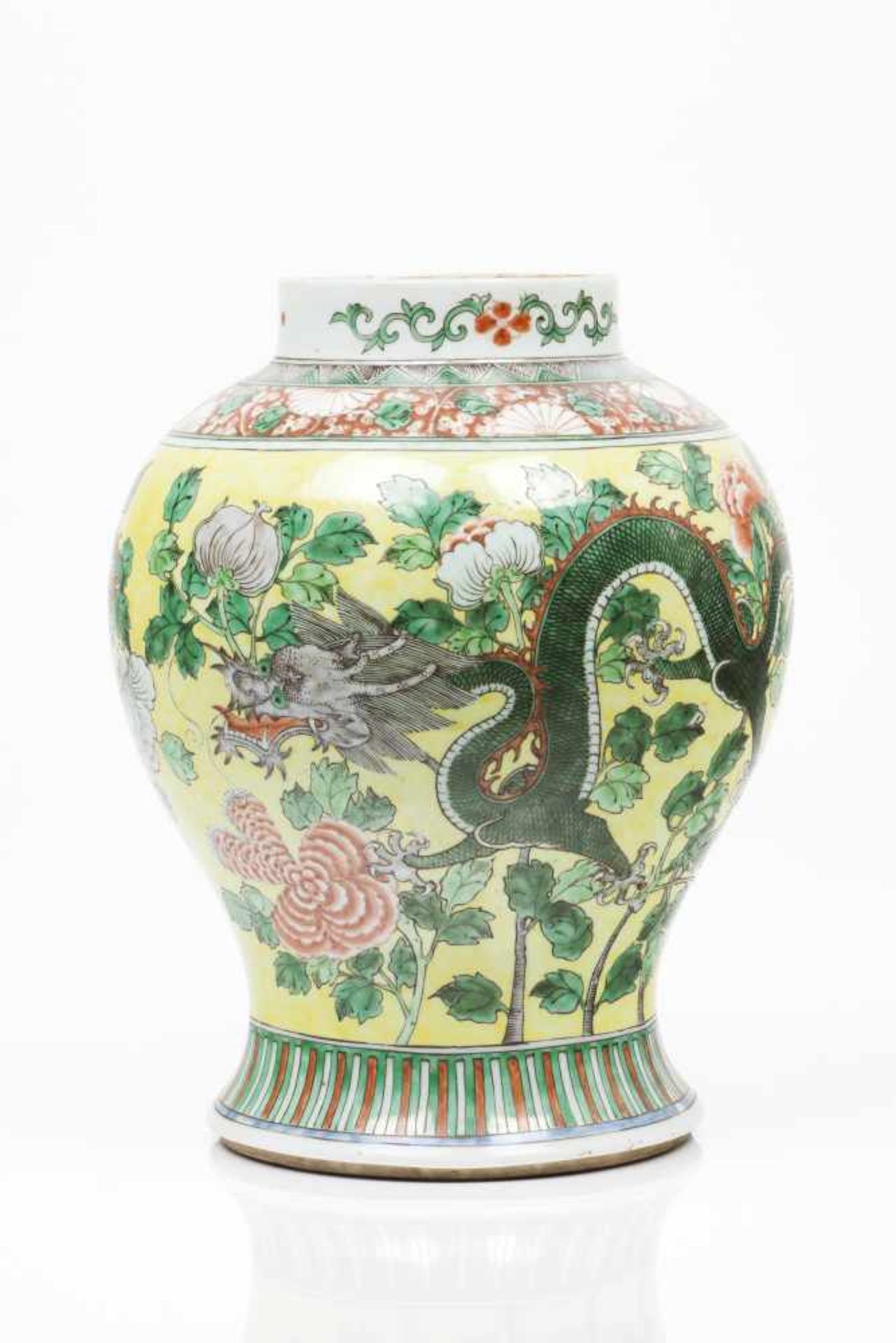 A potChinese porcelain "Famille Verte" enamelled decoration on a yellow ground depicting dragons and