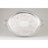 A large trayChristofleFlower and foliage engraved oval baseScroll handles43x64 cm- - -15.00 %