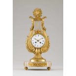 A Louis XVI style Lyre table clockGilt bronze and marbleMoulded and chiselled decorationFrance, 19th