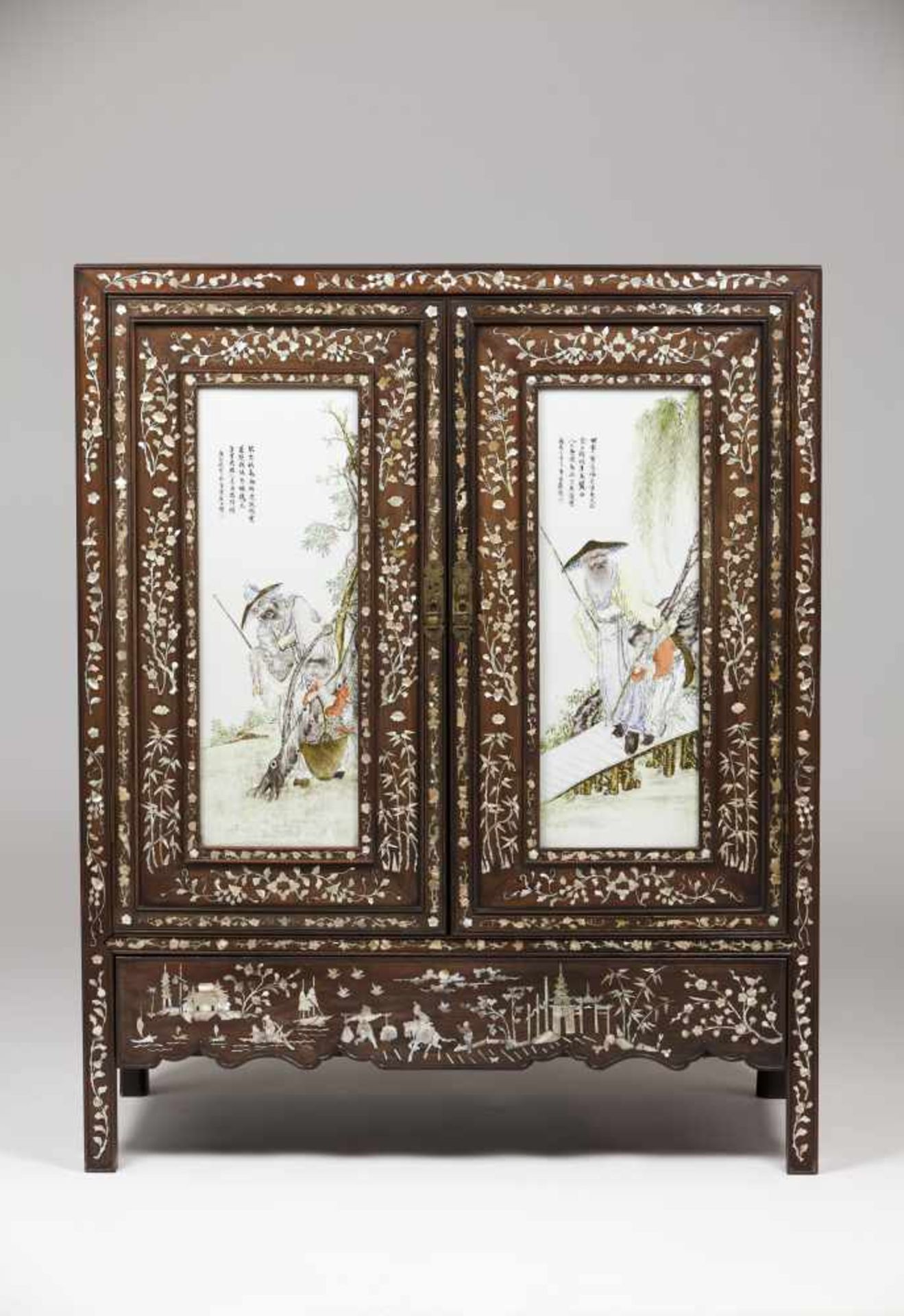 A low cupboardTamarind with mother-of-pearl inlaysDoor fronts with Chinese porcelain plaques of