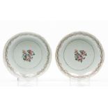 A pair of scalloped deep plates