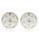 A pair of scalloped plates