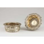 A pair of George IV silver-gilt wine-coasters