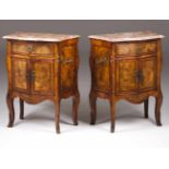 A pair of Louis XV style bedside tables