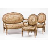 A sofa and pair of armchairs