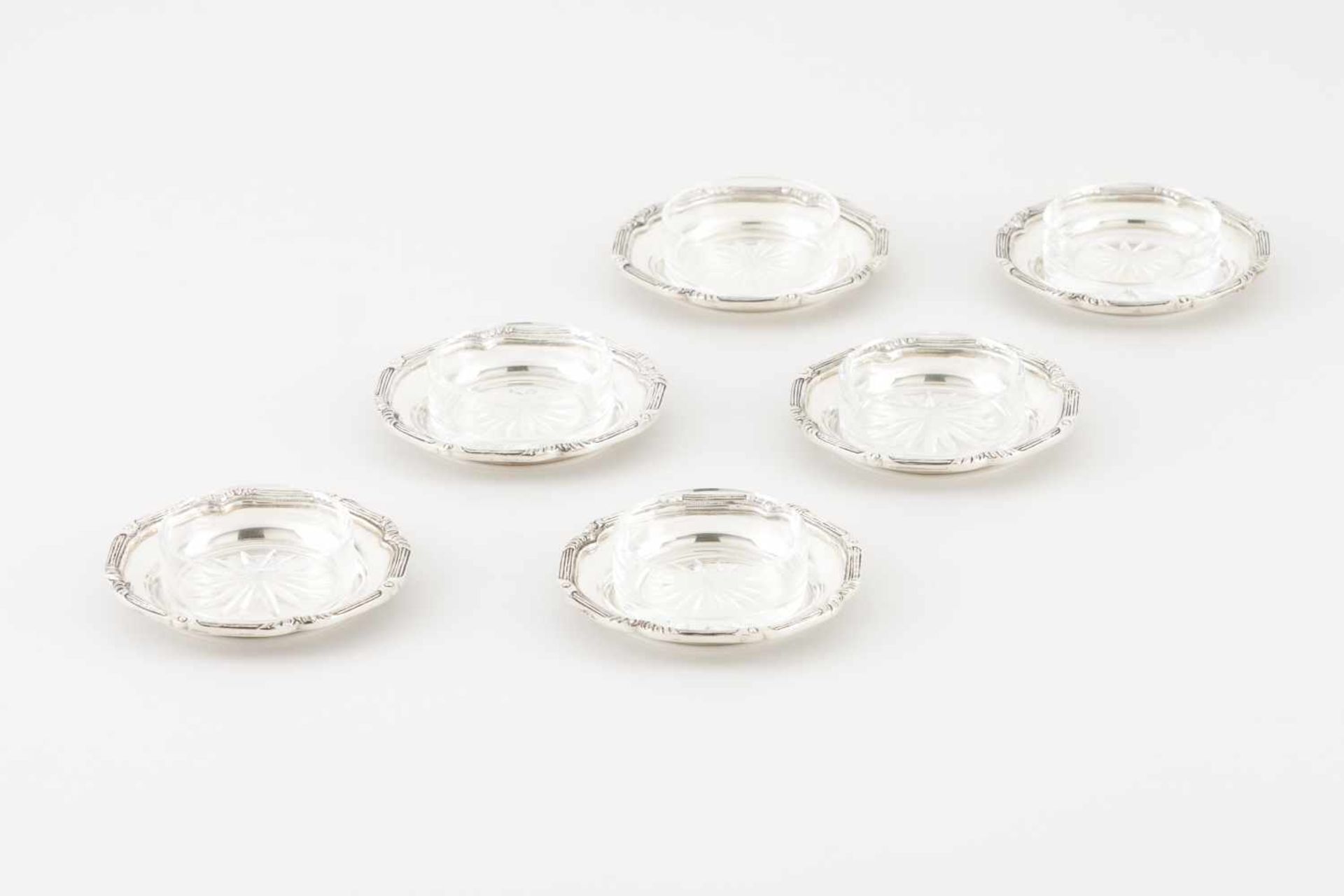 A set of twelve butter dishes