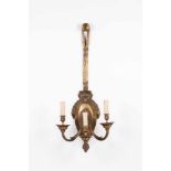 A pair of Louis XVI style three-light wall lights