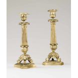 A pair of Charles X style candle stands