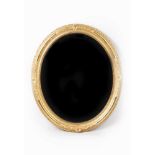 A Romantic oval mirror