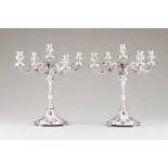 A pair of five branch candelabra