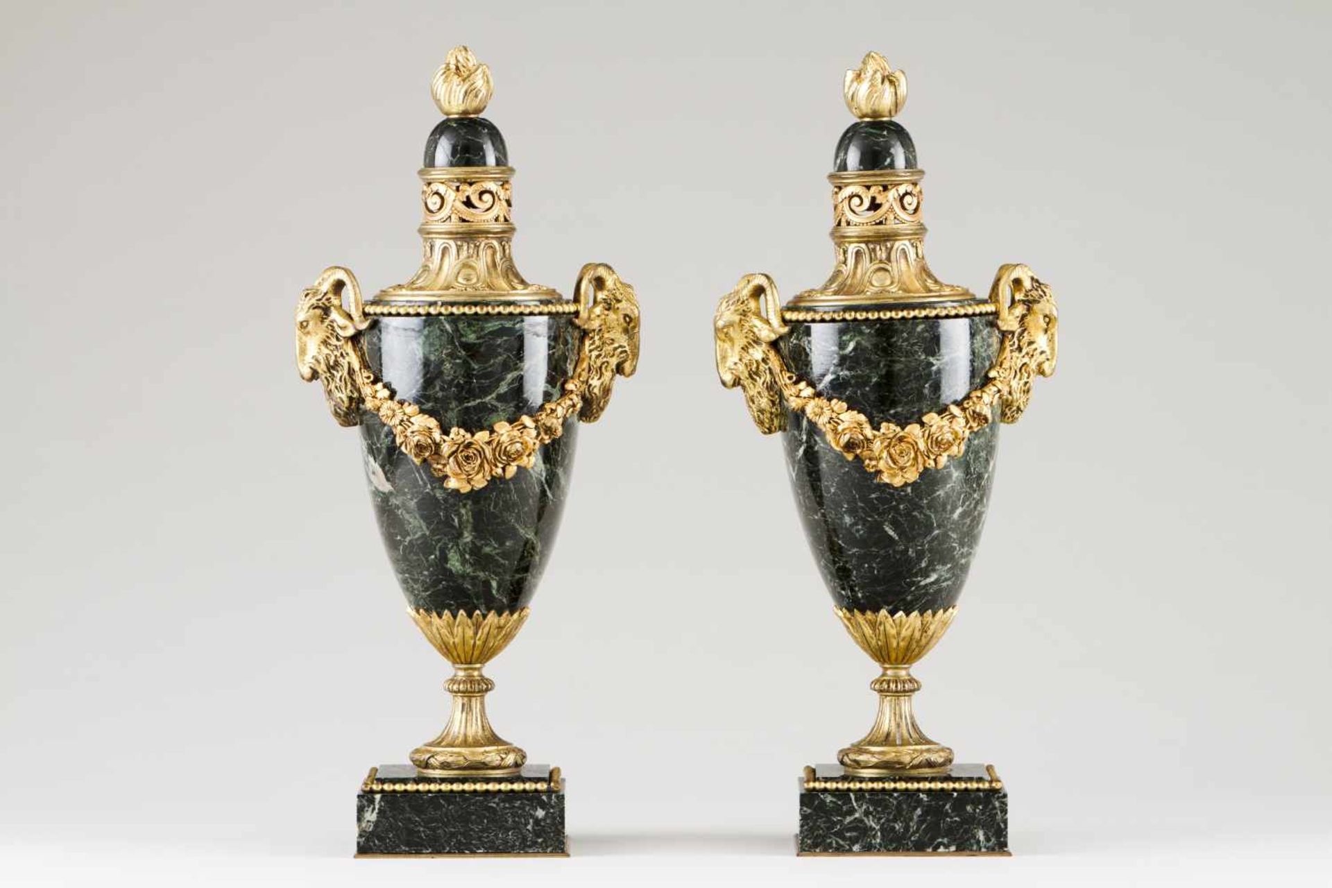 A pair of neoclassical style urns