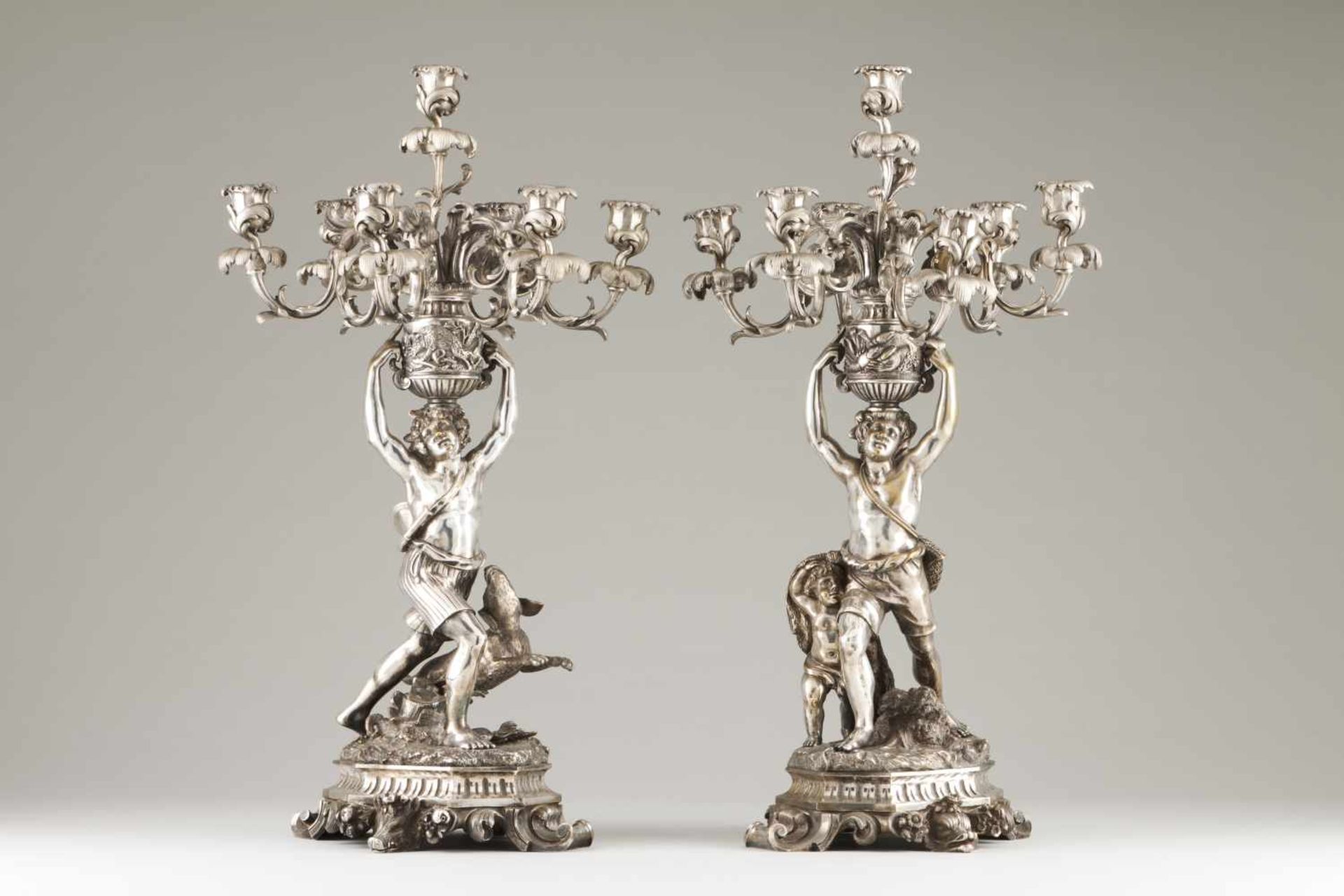 A pair of seven light candelabra