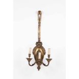 A pair of Louis XVI style three-light wall lights