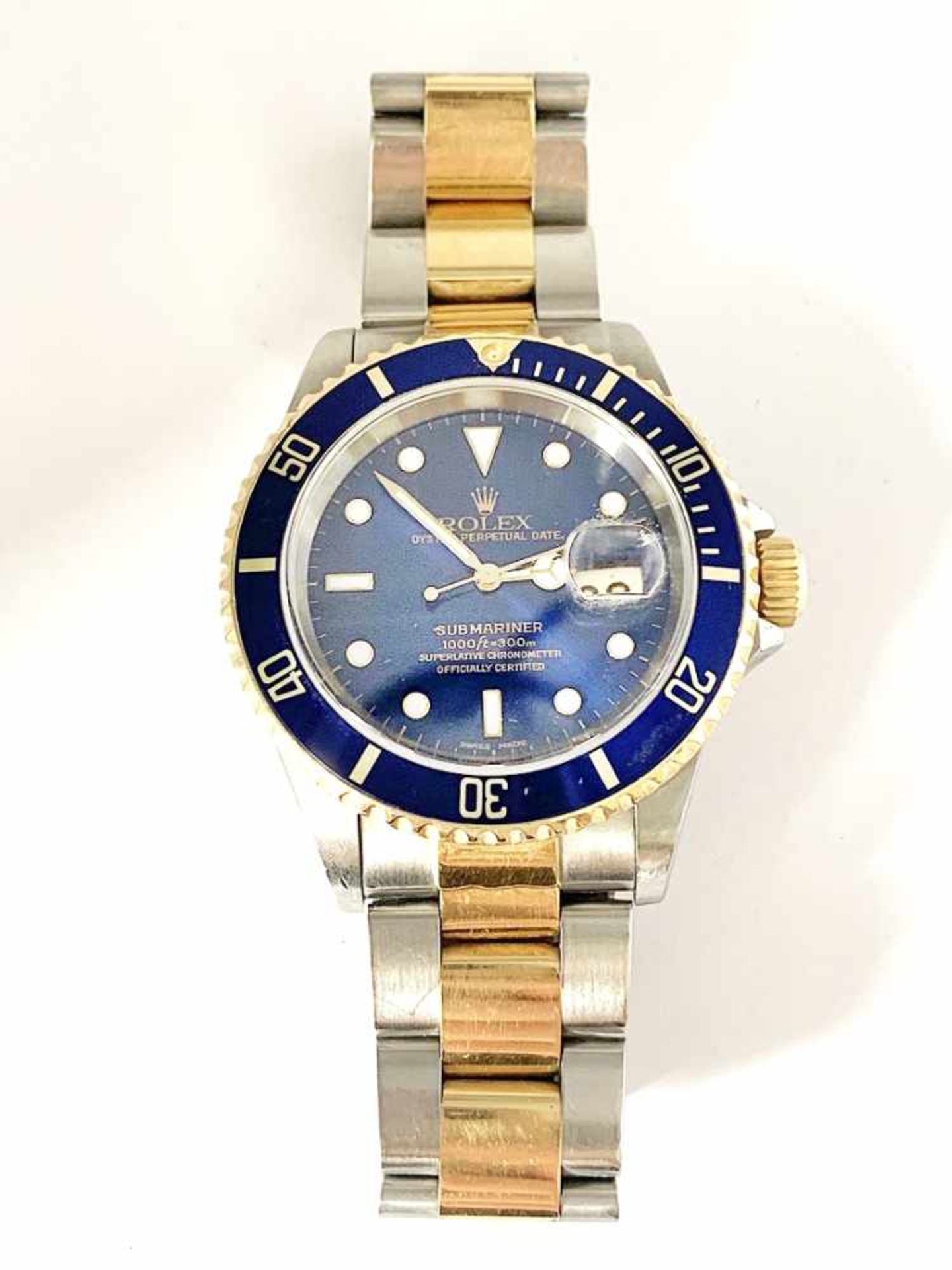 ROLEX Submariner Herrenarmbanduhr, Nr. 16613, Stahl / Gold, Papiere von 12/1999; Ø ca. 40 mm.