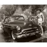Sid Avery (Akron/Ohio 1918 – 2002 Los Angeles)„Rock Hudson washing his car, photographed outside his