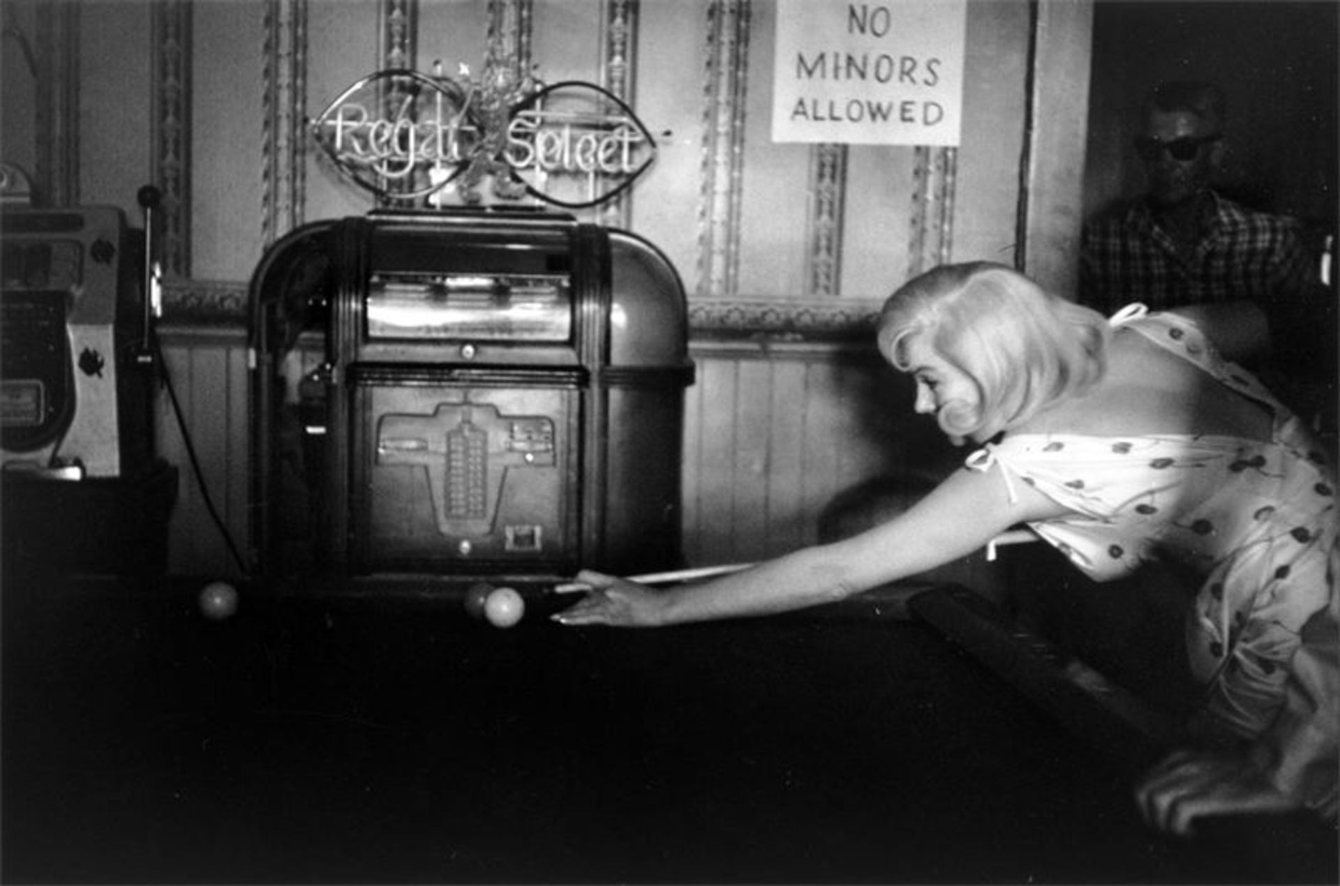 Eve Arnold (Philadelphia 1912 – 2012 London)Marilyn Monroe at the billiard table. Reno, Nevada.