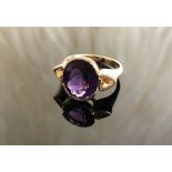 A 9CT Gold Purple Crystal Ring