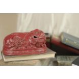 A 19 Century Chinese Guardian Porcelain Lion with Red Glaze