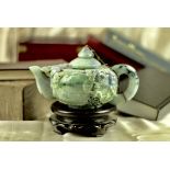 A Superb Chinese Jadeite Oval Teapot and Cover