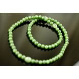 A MARVELLOUS GREEN JADE NECKLACE
