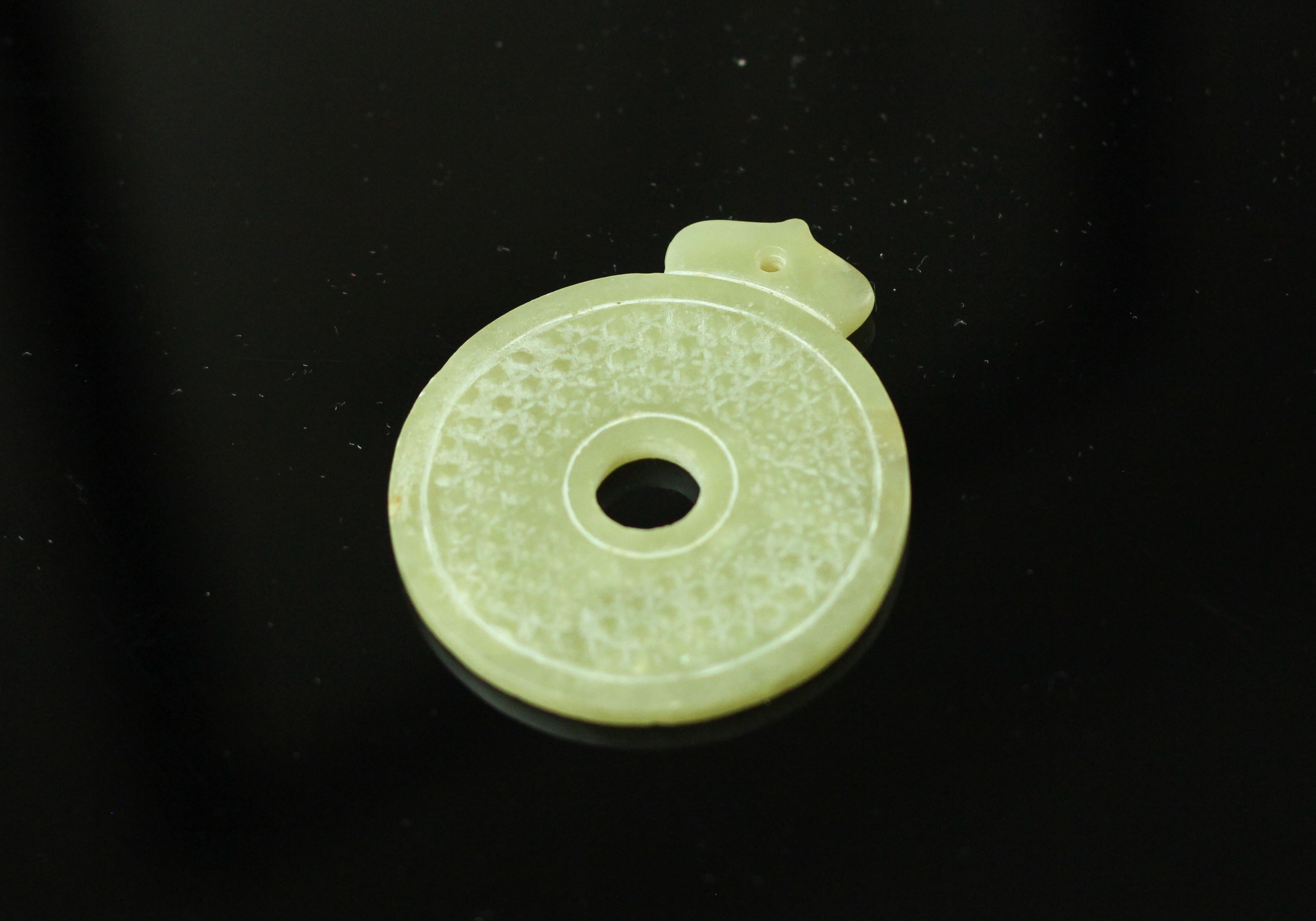 A Chinese Jade Bi Pendant